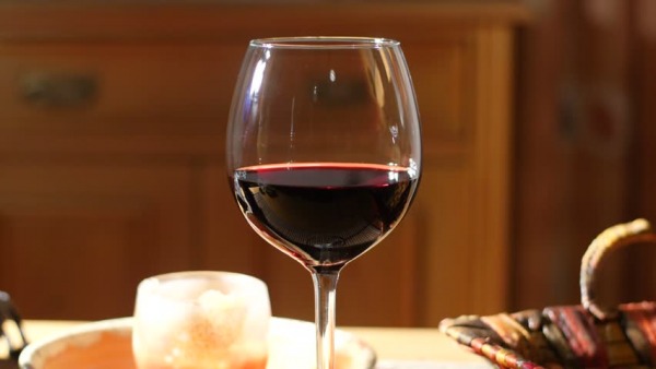 news glass of red wine